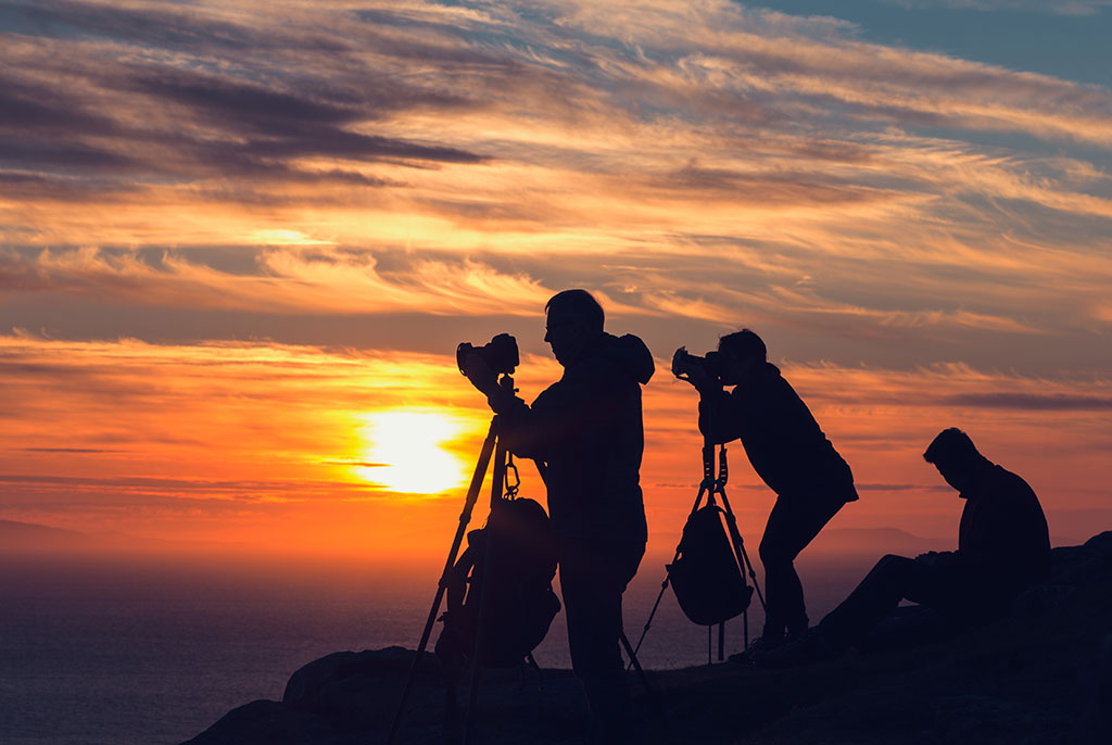 Fotografen beim Sonnenuntergang